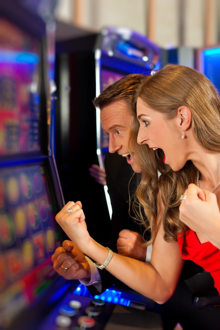 Live roulette wheel and betting interface on mobile phone screen